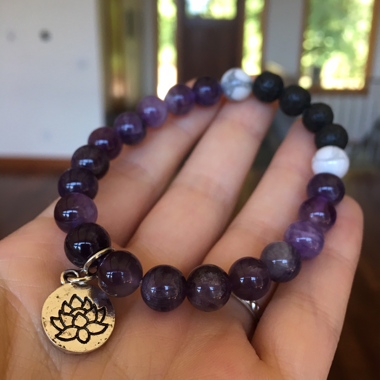 Crystal Mala Bracelet with Lotus Charm and Lava Rock Beads